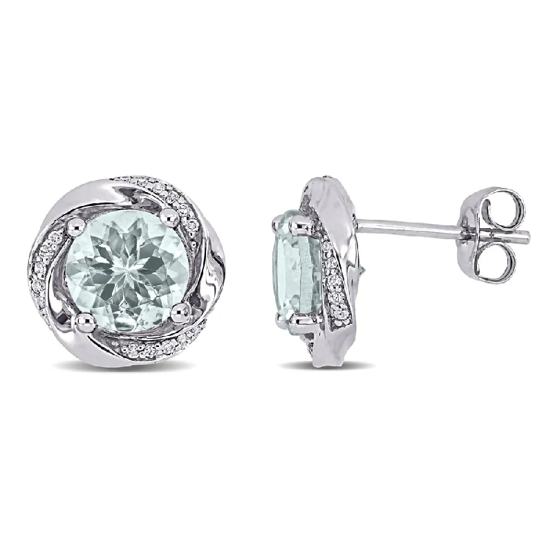 Miadora 10k White Gold Aquamarine and 1/10ct TDW Diamond Swirl Halo Stud Earrings